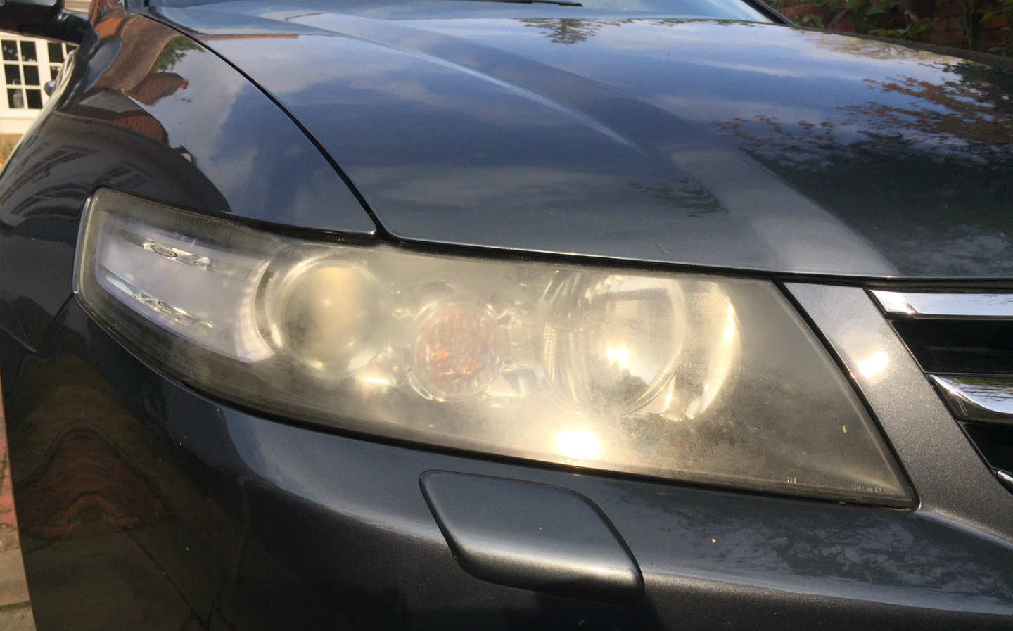 How to restore cloudy car headlight covers