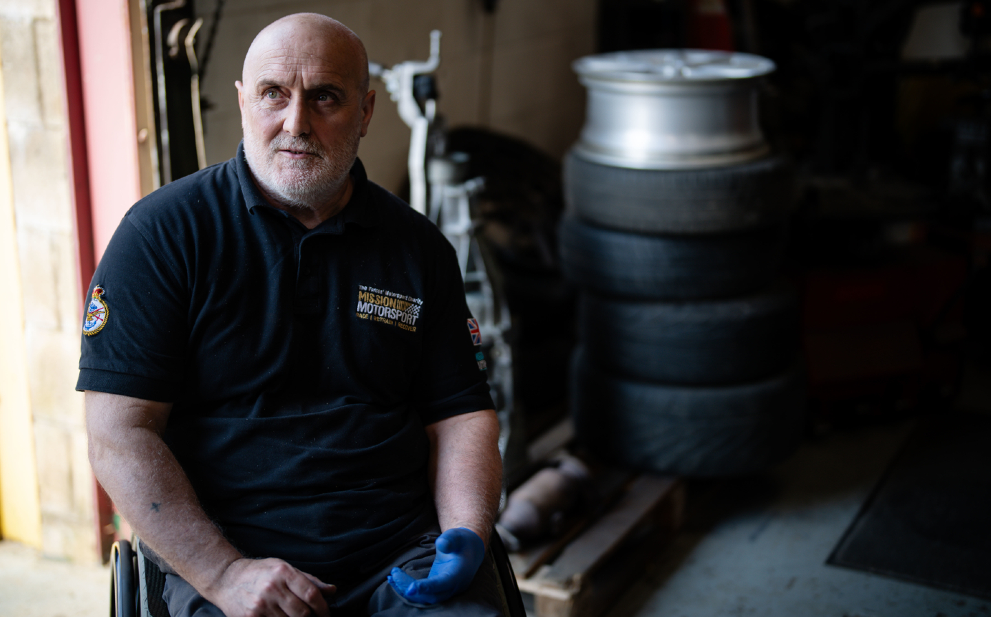 Steve "Dusty" Binns in the Mission Motorsport garage