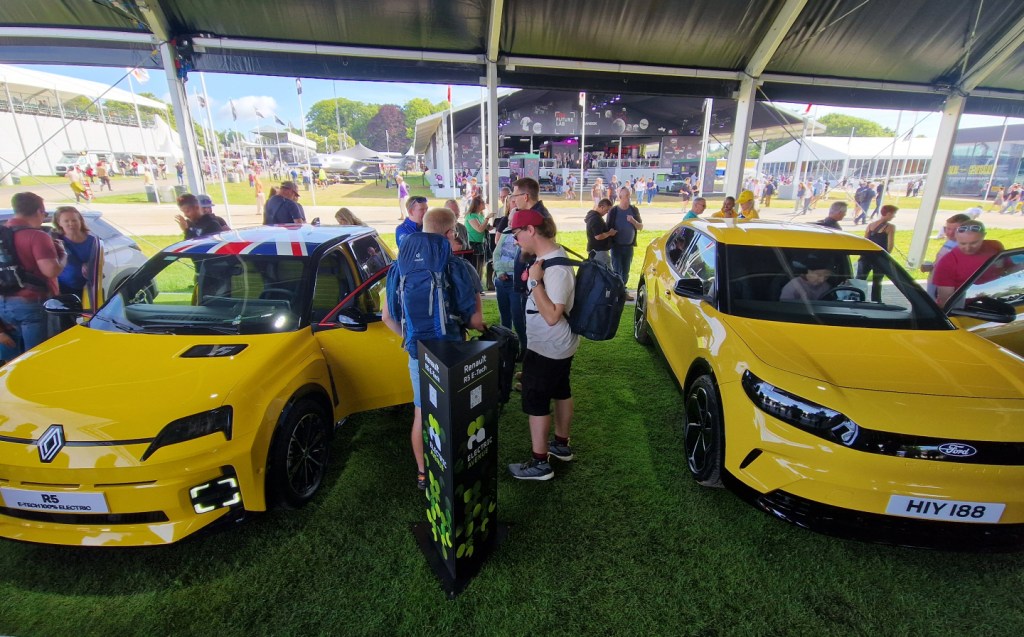 Visitors inspect the new Ford Capri and Renault 5 in Electric avenue at 2024 Goodwood Festival of Speed