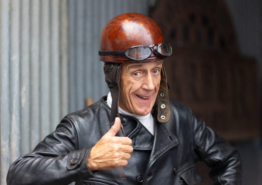 A biker was having fun, despite the inclement weather. Photo: Peter Tarry for The Sunday Times