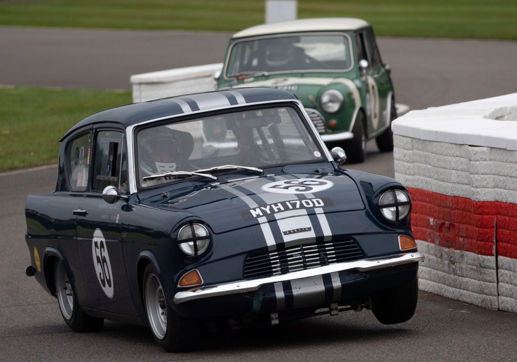 The 1966 Ford Anglia 105E of Darren Turner and Michael Sheraton cocks a wheel through the final chicane in the St Mary's Trophy. Photo: Peter Tarry for The Sunday Times