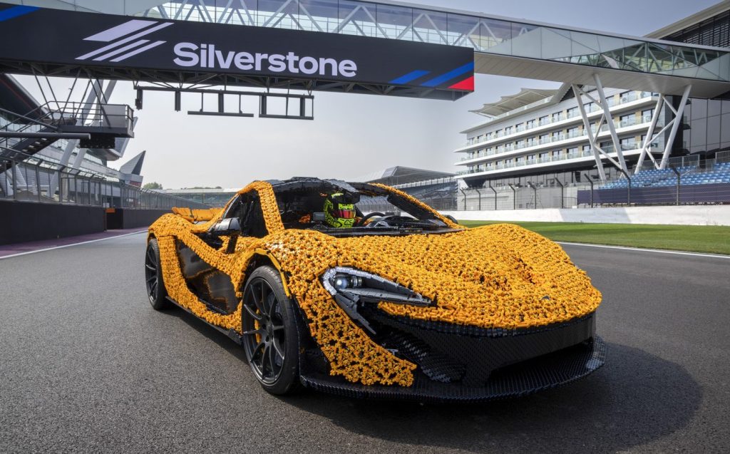 Lando Norris takes on Silverstone Circuit in a life-size Lego Technic McLaren P1.