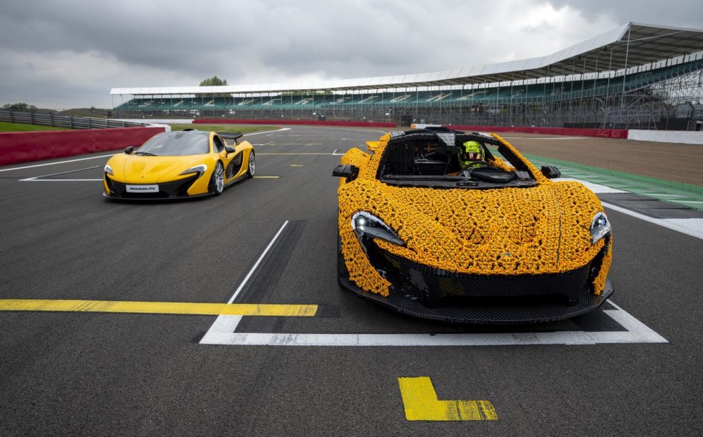 Lando Norris takes on Silverstone Circuit in a life-size Lego Technic McLaren P1.