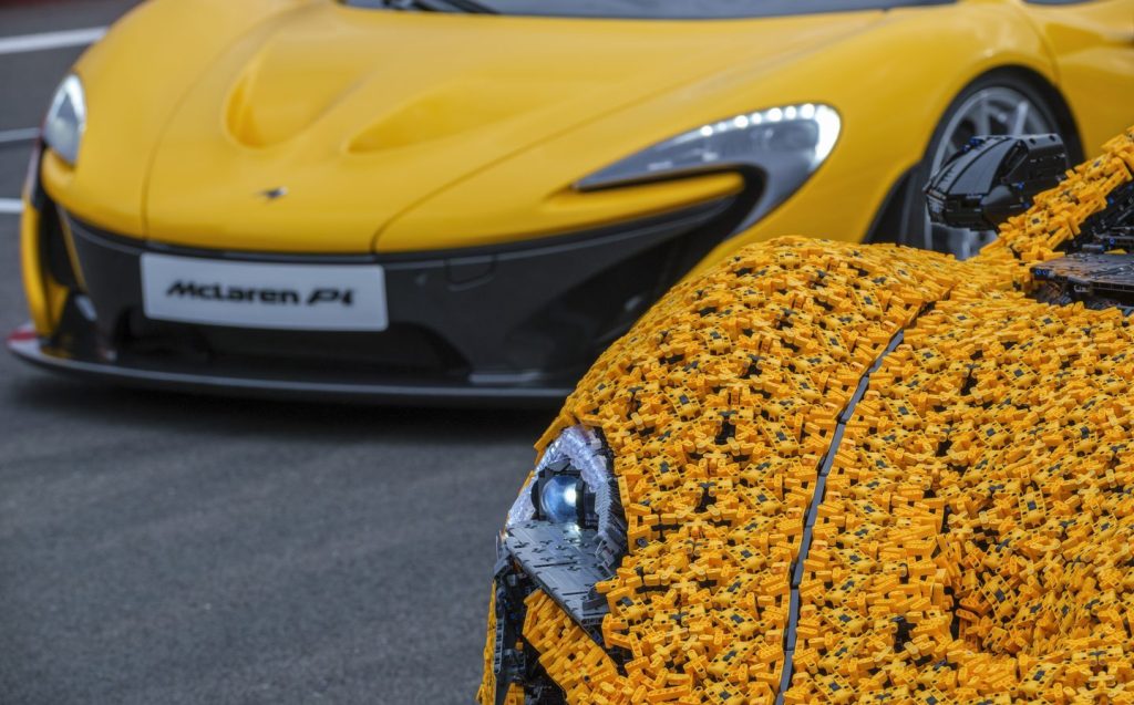 Lando Norris takes on Silverstone Circuit in a life-size Lego Technic McLaren P1.