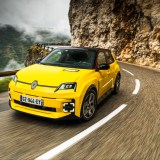 2024 Renault 5 in yellow, on a mountain road