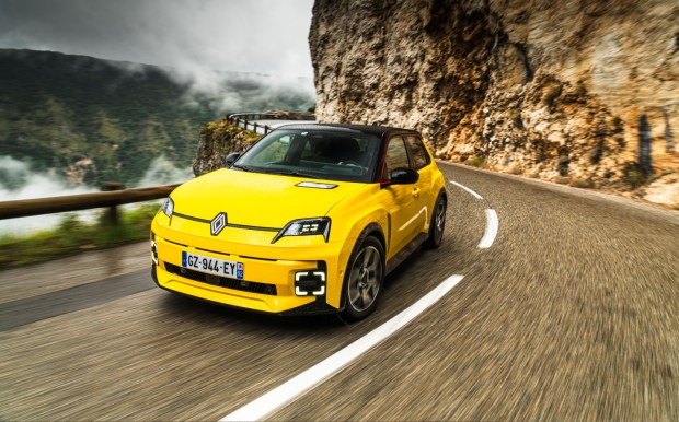 2024 Renault 5 in yellow, on a mountain road