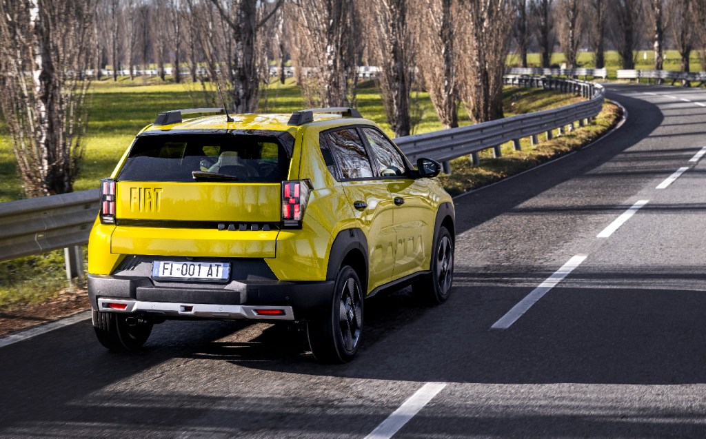 Fiat Grande Panda driving rear 3/4 view