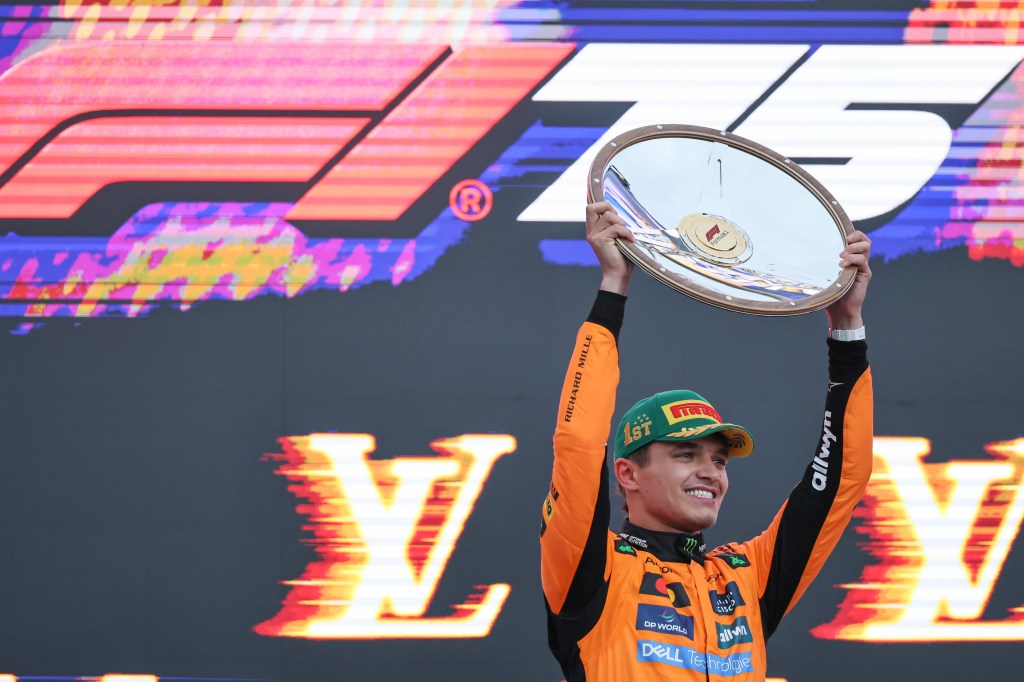 Lando Norris of Great Britain and the McLaren F1 Team clinches the winner's trophy during the race podium of the F1 Grand Prix of Australia at Albert Park Circuit in Melbourne, Australia, on March 15, 2025. (Photo by Paddocker/NurPhoto via Getty Images)