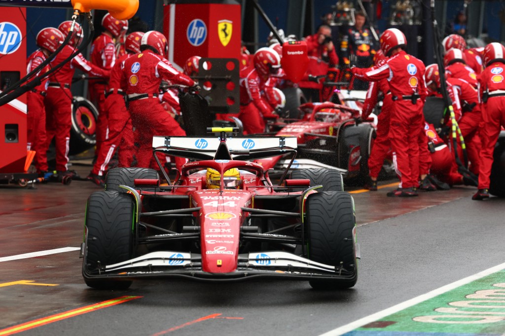 MELBOURNE, AUSTRALIA - MARCH 16: Lewis Hamilton of Great Britain driving the (44) Scuderia Ferrari SF-25 in the Pitlane as Charles Leclerc of Monaco driving the (16) Scuderia Ferrari SF-25 makes a pitstop during the F1 Grand Prix of Australia at Albert Park Grand Prix Circuit on March 16, 2025 in Melbourne, Australia. (Photo by Clive Rose/Getty Images)